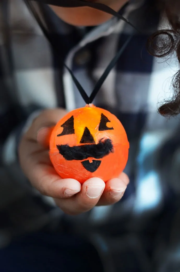 DIY pumpkin light necklace tutorial via Handmade Charlotte