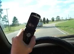 Should car cell phone use be (almost) totally banned?