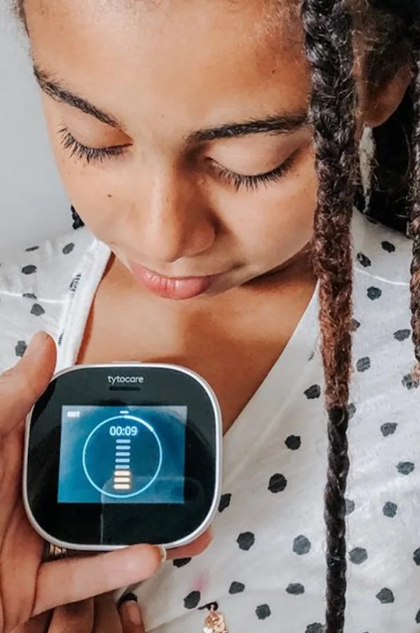 Checking heart rate with the TytoHome on-demand medical exam kit