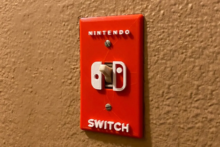 Fun geeky gift idea: this Nintendo Switch switch plate (get it?)