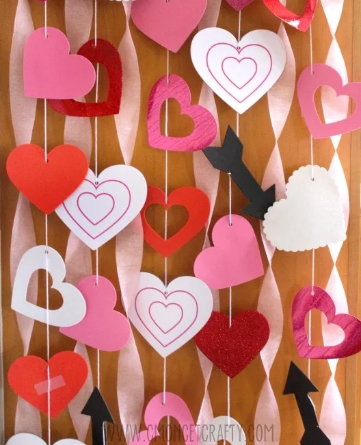 Make your own Valentine's Day Zoom backdrop for your kids with this clever idea from C'Mon Get Crafty