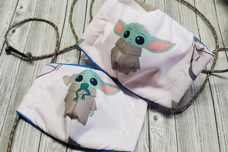 Small but powerful: Baby Yoda face masks for the win