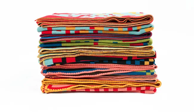 Tech meets home decor, in these cool bitmap blankets by Zuzunaga.